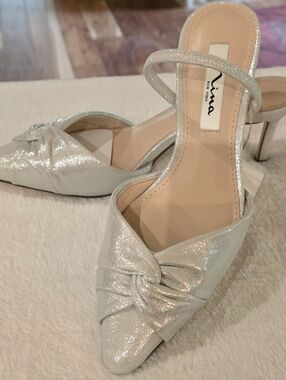 Nina New York Shimmery Silver Knot Pointed Toe Heels